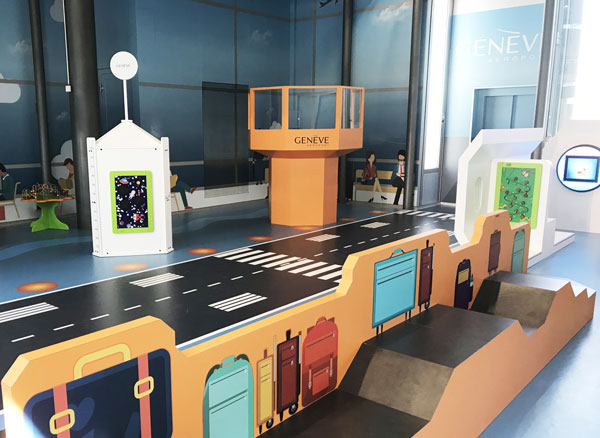this image shows a kids corner with wall design in an airport